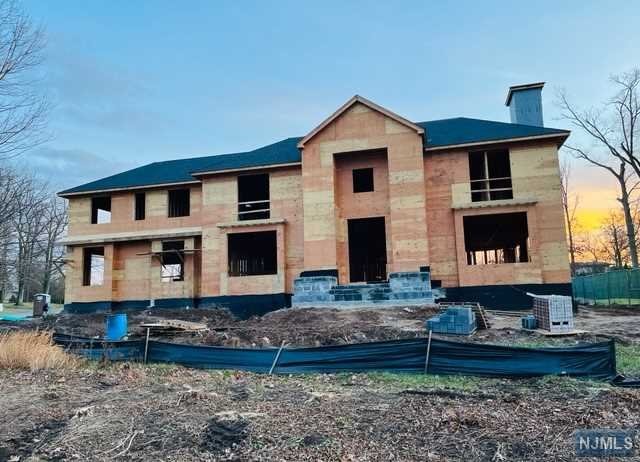 NO OTHER NEW CONSTRUCTION CAN COMPARE. EXQUISITE HOME LOCATED ON A PERFECT HIGH FLAT FULLY GATED 1 ACRE PROPERTY ON TENAFLY'S EAST HILL STREET. ABOUT 12000 SF OF LUXURY LIVING WITH THE MOST OUTSTANDING ARCHITECTURE 8 BRS, 9 FULL BATHS AND 3 HALF BATH 6 FIREPLACES, GOURMET KITCHEN WITH BREAKFAST AREA, BANQUET SIZE DINING RM. STUNNING GREAT /RM LIBRARY/OFFICE, FAMILY ROOM WITH FIREPLACE. SECOND FLOOR OFFERS A LUXURY MASTER SUITE, HER MASTER BATH AND HIS MBTH, HIS/HERS WALK-IN CLOSETS, FIREPLACE,8 BED RM 9.3 FULL BATHR, ELEVATOR, LAUNDRY RM. WALK OUT LOWER LEVEL OFFERS MOVIE THEATER, TEMP CONTROLLED WINE CELLAR, GYM, POWDER ROOM, BEDROOM, FULL BATH, WET BAR, FIRE PL, REC AREA, LAUNDRY RM, 10 FOOT CEILINGS. THE PARK-LIKE PROPERTY PROFESSIONALLY LANDSCAPED. IN GROUND GUNIT POOL, CABANA WITH FULL KITCH AND BATH, OUTDOOR KITCHEN, PATIOS REDIAT HEAT, GENERATOR, SMART HOME , SOUND AND SECURITY SYSTEM AND MUCH MORE. SUPERB SCHOOL SYSTEM, MINUTES FROM NYC. A MUST SEE!