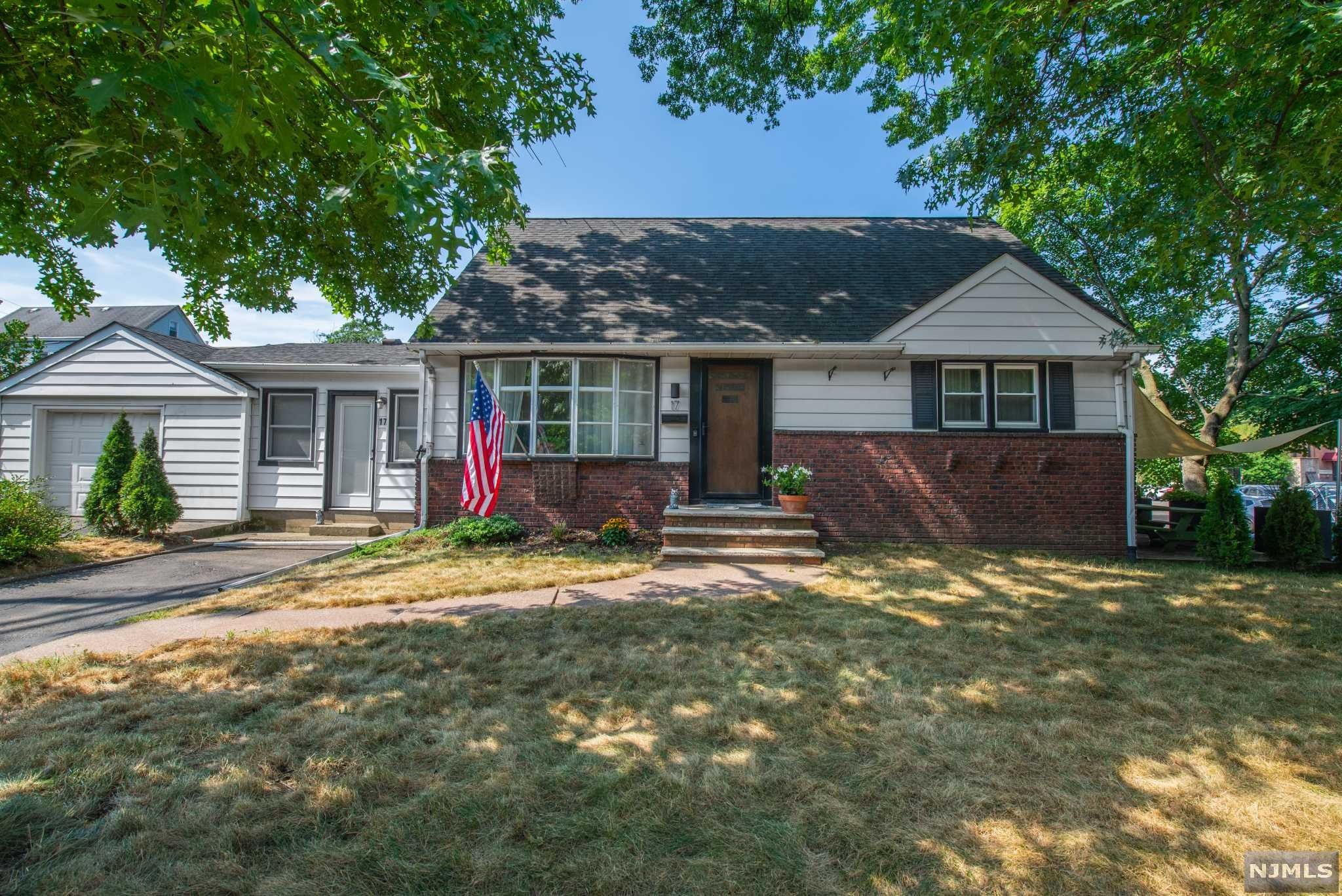 Absolutely Move in Ready! Welcome to this tastefully renovated cape,features: Sun filled Living Room,modern kitchen with dining area, marble counter top & high-end Stainless Steel Appliances,Breezeway it is heated (electric basboard)can be use as Office,Den,Guest Room or Dining Room, newly renovated bath,2 bedrooms with sizable closets & hardwood floors throughout,2nd level it is ready to be finished with City Permits, can be Master Bedroom suite & Bath, full semi-finished basement offer: Family room,play room & laundry room.1 Oversize car garage with electric opener & 2 car driveway, Patio & side yard for entertaining.Located in the most ideal location for NYC commuters steps away from Train station & Bus,also close proximity to major highways,schools,shops & Parks.(Furniture can be purchase)