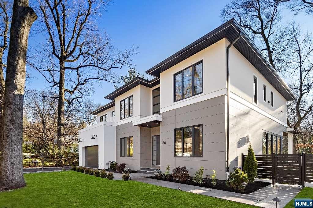 Luxury with Ultra-Modern Style. Spectacular new construction in Englewood's desirable East Hill, minutes from the GWB. Ready February 2023 this property offers 7,000 sq. ft. of luxury living space with six bedrooms, six full bathrooms and two powder rooms, home theater, dining room with wet bar, two laundry rooms, mud room, recreation room, sitting room with gas fireplace and great room with double height ceiling. The enormous chef's kitchen features ultra-modern design with space for informal dining adjoining a large pantry with separate sink and refrigerator. *Italian-made cabinetry; *Premium European kitchen appliance. *European triple-glazed windows. *Four-zone HVAC system, with separate zone for master bedroom. *Radiant floor heating in master bathroom and kitchen. *18x36 saltwater gunite pool with spa and sundeck; *Beautifully landscaped yard; *Outdoor kitchen; *Firepit with built-in seating.