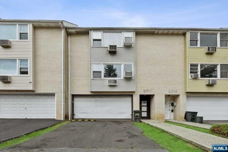 Townhouse style 2 family home, ready for your personal touch. Top and bottom units have identical floor plan. Each with two bedrooms, and two baths on each floor. Open concept living room, eat-in-kitchen and a full bathroom. The first floor has direct access to the fully fenced backyard. Basement is a street level walkout to yard and 2 car garage and driveway. Located walking distance to NYC public transportation, schools, restaurants houses of worship and shops. Street parking. Tenants are month to month.