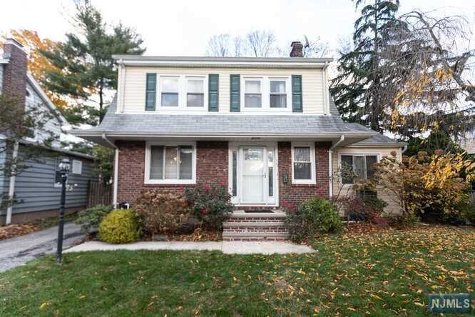Colonial House in a convenient location. This house offers living room with wood burning brick fireplace, hardwood floor, formal dining room, kitchen and family room with a slider to the deck in the first floor. Three bedrooms and full bath on the second floor. Finished basement: recreation room, full bath/ laundry/ utility and storage room. The house has a detached two car garage. Consider the potential of this house and the accessibility to the town business center, houses of worship, park and NYC transit. A must see property.