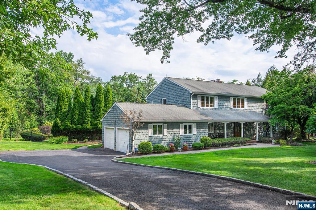 Nestled in one of Wyckoffâ€™s most sought-after neighborhoods, the prestigious Sicomac section, this spacious 5 bedroom, 3.5 bath home presents an exceptional opportunity to create your dream home. Set on a beautifully level and private .86 acre property, the home offers approximately 3,700 square feet of living space plus a finished basement and has a versatile floor plan and outstanding potential. Designed for comfortable living and entertaining, the home features a double sided fireplace, a double height entry foyer, generously sized rooms, hardwood floors, a first floor home office, a full basement with a full bath, and a convenient mudroom with direct access to the backyard and two car garage. Step outside to enjoy the expansive bluestone patio overlooking the 20â€™ x 40â€™ in-ground pool, surrounded by lush landscaping and supported by an underground sprinkler system. With solid construction, good bones and an unbeatable location, this home is ready for its next owner to renovate and personalize. This is a rare opportunity to own in one of Wyckoffâ€™s premier neighborhoods close to top rated schools, parks, shopping, and transportation.