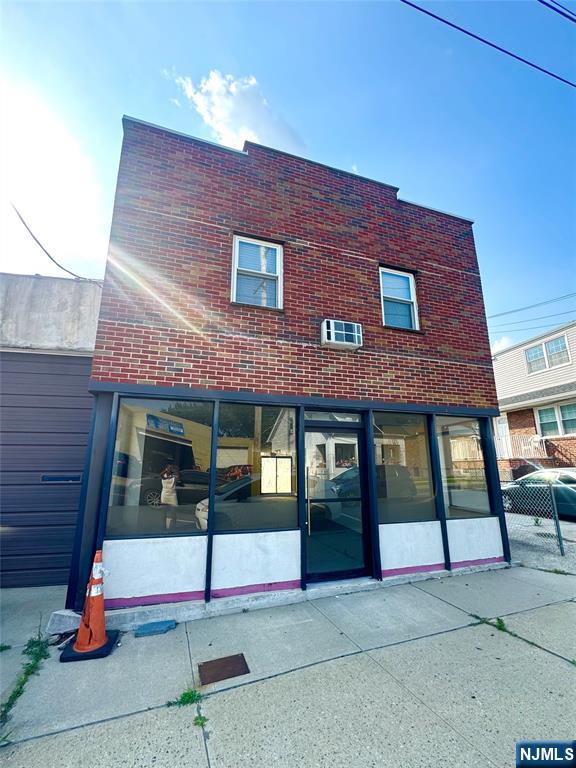 Lovely quaint one bedroom apartment on the second floor of a mixed use brick building. Close to transportation and all major highways.. street parking. All utilities included.
