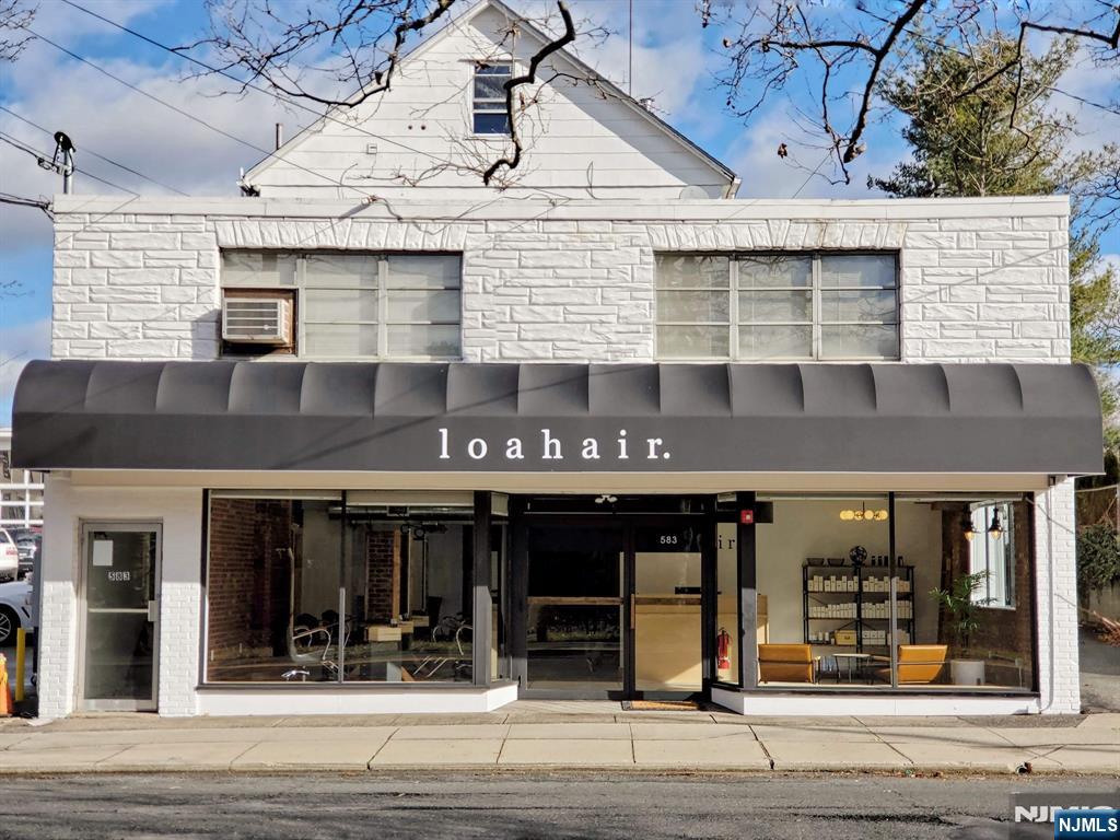Exceptional opportunity in the heart of Westwoodâ€™s thriving downtown district. This well-positioned property offers a flexible, income-generating layout suitable for both investors and owner-occupants. The first level features an established hair studio with strong street exposure and consistent foot traffic. The upper levels include an office and a residential apartment, offering versatile use options for rental income, live/work arrangements, or expanded business operations. At the rear of the property, a three-bay garage adds further value and is currently utilized for additional income, enhancing overall cash flow potential. Ideally situated near local shops, dining, and NJ Transit, the property offers excellent accessibility and strong long-term growth prospects within desirable Bergen County. A rare chance to acquire a well-located asset with multiple income streams and significant upside potential.