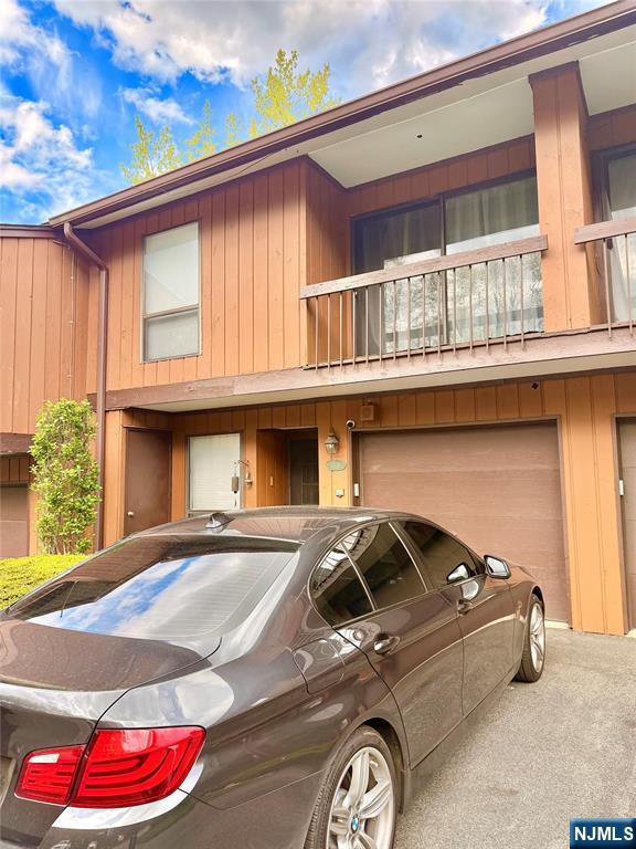Welcome to this renovated, ready to move townhome! Large living room with a fire place and a new celling fan. Kitchen with granit counter top, stainless steel appliances and quick access to the dinning area. 3 large bedrooms, the bedroom in the lower level with sliders to the balcony. Updated bathrooms with new vanities. Water heater is about 4 years old. One car garage, guest parking, pool. Conveniently located just moments from public transportation. Must see!