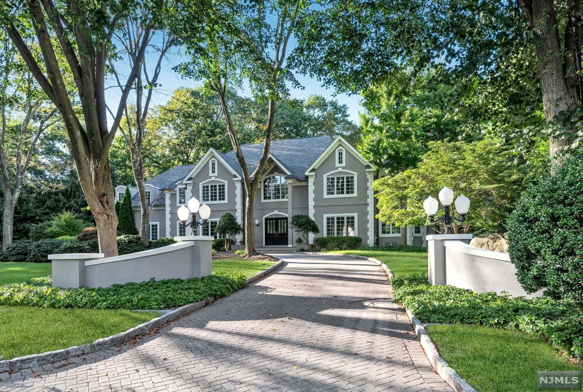 LOVELY MANOR STYLE HOME W/POOL,SPA, OUTDOOR KITCHEN & FULL SERVICE CABANA! SITUATED ON A PRIVATE CULDESAC STREET W/FABULOUS CURB APPEAL. 2 STORY ENTRY W/BRASS STAIR RAIL, MARBLE ENTRY FOYER AND SPACIOUS FLOOR PLAN. LARGE LR W/FP IS BRIGHT & OPENS TO LIBRARY. 2 STRY GRT RM W/FP & BAR. 1ST FL OFFICE W/FULL BTH & ACCESS TO GYM OVERLOOKING POOL. LRG KITCHEN W/BRKFST RM, STUNNING SUN RM W/CEDAR MILL WORK. 1ST FL LNDRY & PR COMPLETE THE 1ST FL. LARGE PRIMARY SUITE W/STG RM & FP, 2 WIC'S, LUX BATH. LARGE BR ENSUITE, 3 ADDT'S BRS & FULL BATH COMPLETE THE 2ND FL. LOWER LVL IS FINISHED W/WINE CLR, THEATER, REC ROOM, FULL BATH & BONUS RM. GARAGE IS FULLY OUTFITTED. THE YARD IS A HOME OWNERS PARADISE! COME MAKE THIS YOUR OWN!