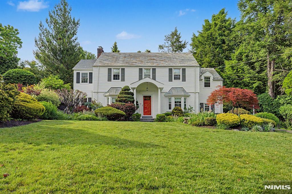 Welcome to this beautifully updated 4 bedroom, 3.5 bathroom home nestled in Tenaflyâ€™s highly sought-after Country Club neighborhood. Boasting exceptional curb appeal and timeless charm, this move-in-ready residence blends character with modern convenience. The thoughtfully designed first floor features an inviting entry foyer, powder room, a spacious living room with a fireplace and a formal dining room that opens to the updated kitchen. Adjacent to the kitchen is a versatile bonus room offering endless uses. A dedicated office and homework room with French doors leading to the backyard complete the main level. Upstairs, the primary suite offers two walk-in closets and a private home office, creating a peaceful retreat. Three additional generously sized bedrooms and a hall bathroom provide ample space for family and guests. The finished lower level includes a recreation room, full bathroom, laundry area, and plenty of storage. Located on a quiet, tree-lined street and within walking distance of schools and houses of worship, this special home offers comfort, convenience, and elegance in equal measure. Donâ€™t miss this exceptional opportunity to make it your own.