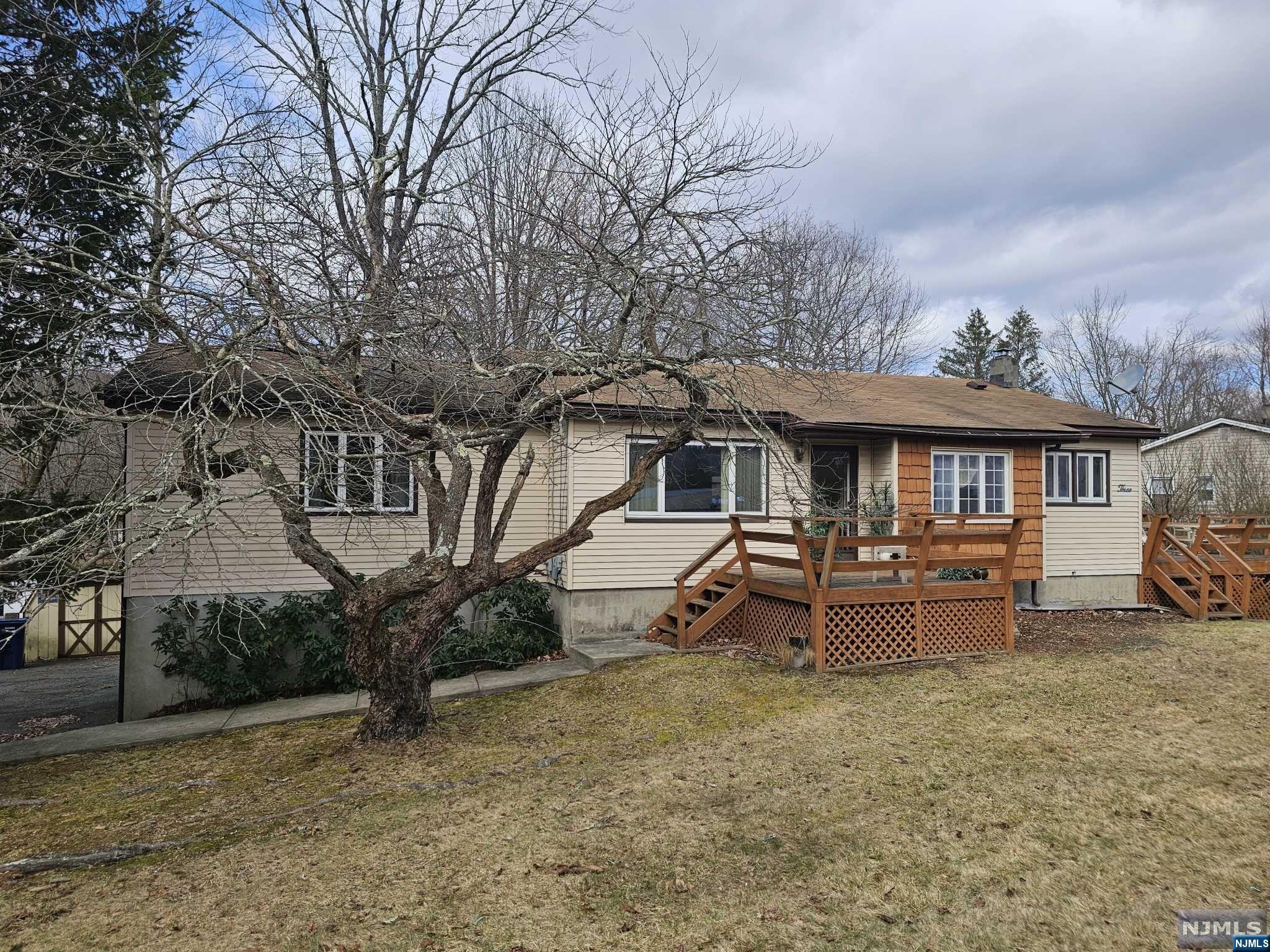 Wonderful Lake Tamarack with endless beauty. Expanded 3 bedroom ranch with family room addition over 2 car garage, situated on double lot, .34 acres. One level living. Large basement. Central air. Master bedroom with powder room. Living room open to dining room offering lots of space. Dining room open to kitchen with access to deck with seasonal lake views. Enjoy two beaches, playground, picnic area, sports court, swim team, fishing and more. Convenient location-minutes to route 23.