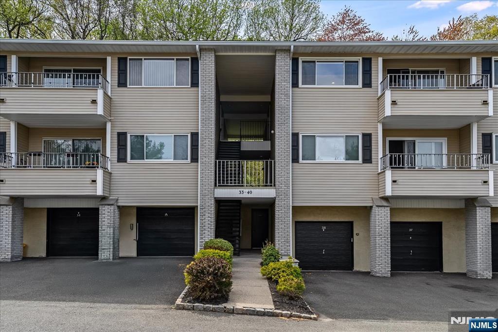 Welcome to this exceptionally clean and well-kept condo located in one of Cedar Grove's most sought-after complexes. This inviting home features a spacious living room filled with natural light perfect for relaxing or entertaining. The modern kitchen is equipped with sleek stainless steel appliances, offering both style and functionality. Within the kitchen, you will find quartz countertops and a great-sized breakfast bar. The primary bedroom is generously sized and includes a private full bath, providing comfort and convenience. Residents of the complex enjoy access to a beautifully maintained pool, ideal for warm-weather relaxation. Don't miss this opportunity to live in a quiet, well-maintained community with top-tier amenities and easy access to local shopping, dining, and NYC transportation. Your new home awaits you! A must-see!