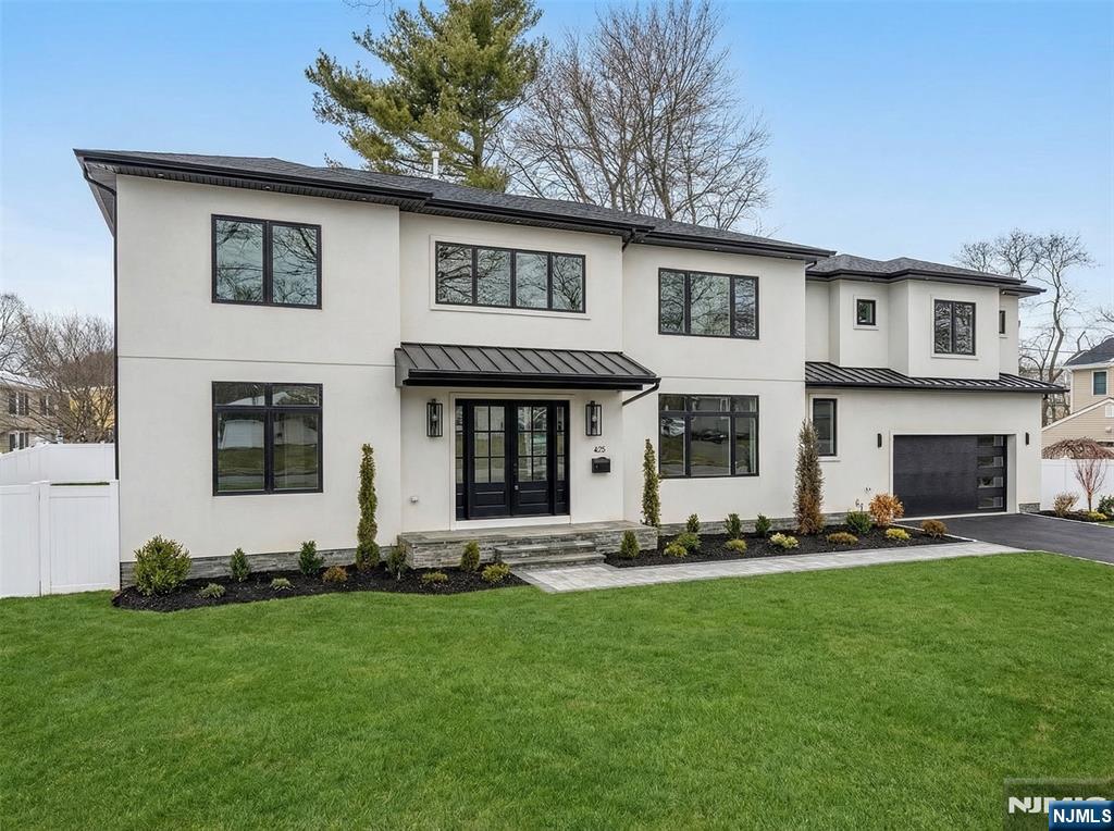 Brand new construction done right in one of the most sought-after locations in Paramus, delivering the perfect blend of scale, design, and luxury finishes throughout. This impressive 7 bedroom, 6.5 bathroom custom residence offers a thoughtfully designed layout with exceptional craftsmanship and elevated materials at every turn. The main level showcases a 2 story entrance foyer, stunning chefâ€™s kitchen with quartz countertops, premium appliance package, and custom cabinetry, seamlessly opening to the living and dining spaces ideal for both everyday living and entertaining. A first-floor bedroom with private en-suite provides the perfect setup for guests or extended living. Upstairs, the oversized primary suite offers a true retreat, complete with a spa-inspired bath featuring a soaking tub, glass-enclosed shower, and dual walk-in closets. The fully finished walkout lower level is rarely found and designed for lifestyle and entertaining, featuring a private movie theater, dedicated office, additional bedroom and full bath, and a spacious recreation area with custom wet bar. All set in a prime Paramus location close to NYC transportation, top-rated schools, parks, shopping, and major highways. A standout opportunity offering luxury, space, and convenience in one exceptional new construction home.