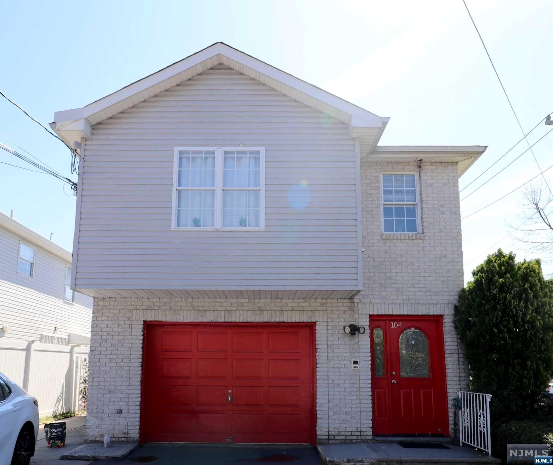 Welcome!!!!! A well-maintained, two-family home conveniently located on all major highways has everything you are looking for!!! And sits on a corner lot in the North Section. Features: First Floor Side entrance 'Open Floor Plan.' Kitchen, Living & Dining room, two bedrooms, and one full bath laundry room. The second floor has three large bedrooms, two full baths, hardwood floors, and carpet. Exterior Brick front, vinyl siding, Large Deck in the rear Garage, a driveway for two cars, spacious fenced-in side, and backyard,