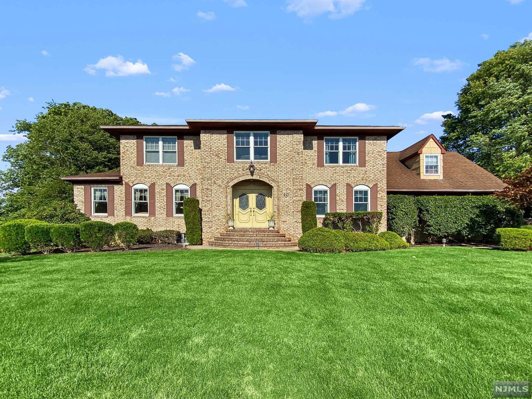 Prime Cedar Grove location - get ready to bring your vision of splendor to this spacious, custom built Colonial on a quiet cul-de-sac. Enter into a grand foyer, formal living room with fireplace, dining room, perfect for entertaining, fantastic family room with fireplace. Main bedroom with bath, dressing area and walk-in closet, 3 additional large bedrooms, plus a bonus room off MBR. The back yard is truly a private sanctuary with a built-in pool. This home is located near NYC direct train, and a just stone's throw from Upper Montclair!