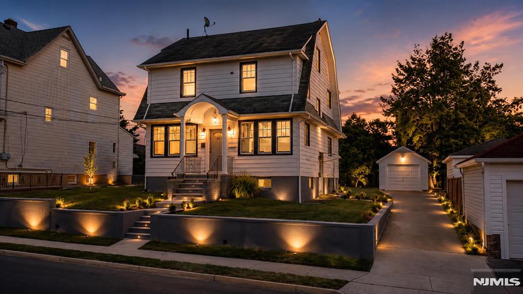 WELCOME TO 12 HARTMANN IN GARFIELD! Fully INTERIOR renovated two-family home offering exceptional versatility for both owner-occupants and investors. Each unit features a private entrance, providing comfort and privacy. The first-floor apartment showcases an open-concept layout with a brand-new kitchen, spacious living and dining area, two bedrooms, and a full bath. The second unit spans two levels and offers a new kitchen, three bedrooms, and a full bath, creating ample living space.The climate-controlled, fully finished basement includes a common laundry area, full bathroom, and flexible finished space ideal for recreation, a home office, gym, or extended living use. Additional highlights include separate living areas, modern interior finishes, and move-in-ready condition throughout.Outside, enjoy a long driveway with parking for up to four vehicles, a detached garage, and a generously sized backyard perfect for entertaining, gardening, or outdoor enjoyment. Conveniently located near shopping, dining, schools, parks, public transportation, and major highways. Whether you're seeking a strong investment opportunity or a multi-generational living solution, this turnkey property offers outstanding value and flexibility.**SHOWINGS DURING OPEN HOUSE 6/6 & 6/7 12:00-2:00PM**