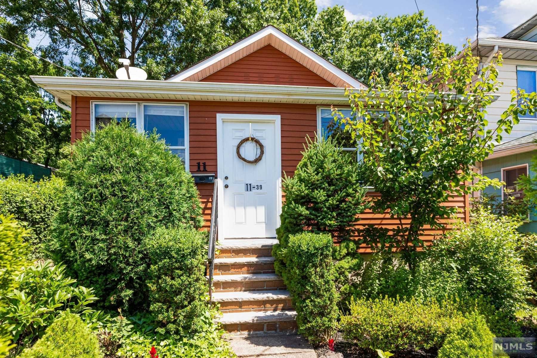 This charming West Orange cottage is located in a great neighborhood near loads of restaurants, shopping, and transportation. Well maintained, it features hardwood floors, beamed ceiling in living room, a newer roof and newer gas furnace. The enclosed front porch offers additional space for having coffee with friends or a relaxing spot for reading. Three bedrooms are all on ground level and one full bath. The semi-finished basement also has one full bath and lots of storage. Covered deck behind the large two-car garage makes a great warm weather retreat. There's a vegetable garden in sweet backyard and plenty of parking space as well.