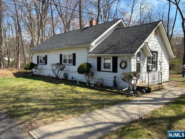 This charming 2-bedroom, 1-bath home sits on a beautiful 1.79-acre wooded, park-like property offering privacy and endless potential. Whether you choose to enjoy the home as it is or expand to create your dream home, the possibilities here are truly special. Inside, you'll find a large dining room, cozy living room, and spacious bedrooms, providing a comfortable and functional layout for everyday living. The home features hot water baseboard heat throughout and a new hot water heater installed in November 2025. A detached 2-car garage offers added convenience and additional storage. Ideally located near a community park, baseball field, and major highways, this home is also a commuter's dream with a NYC bus stop just two blocks away. Located within the highly regarded Wayne school system.