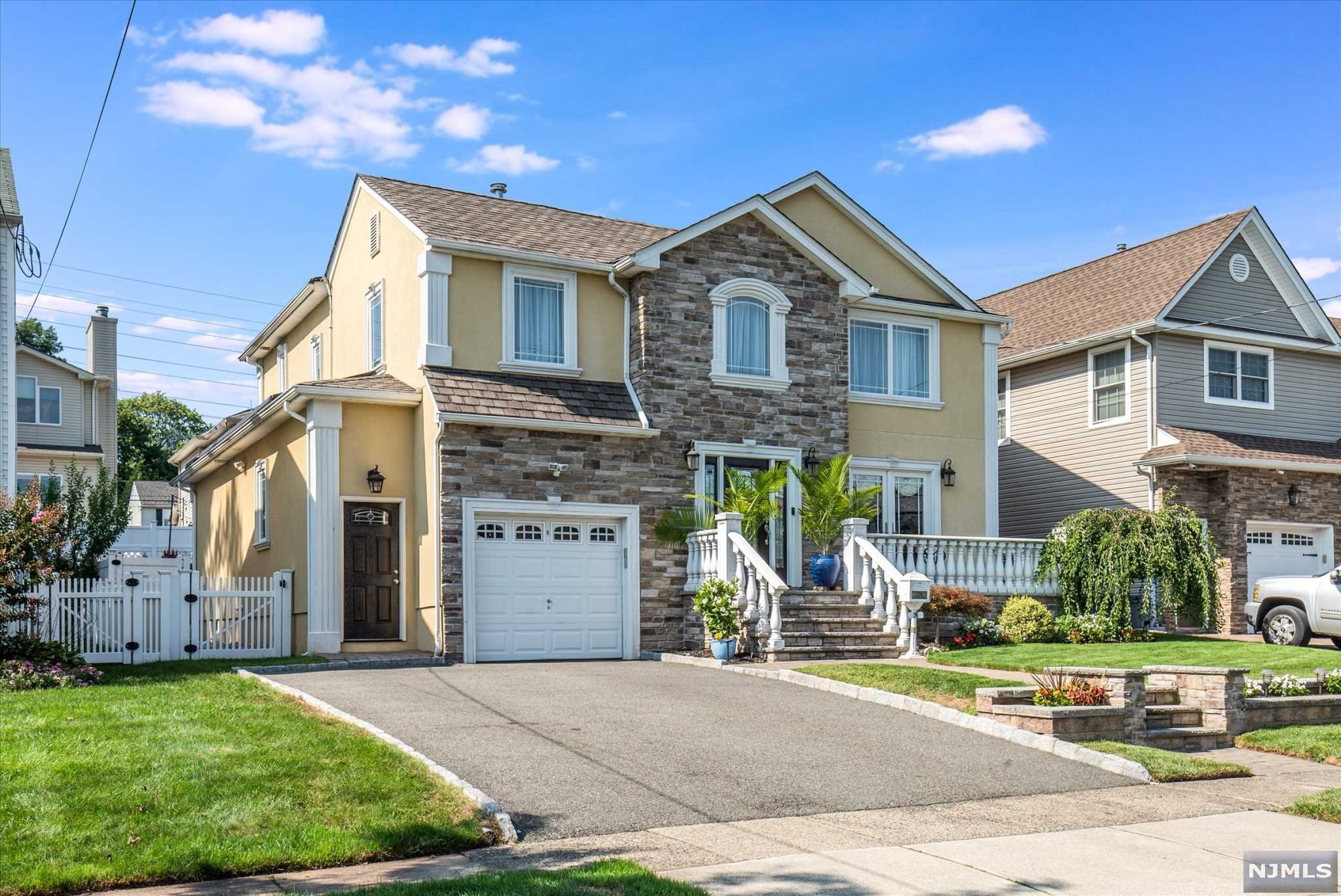 Gorgeous and completely updated colonial in the heart of Nutley with so much to offer! Step inside to this open floor plan home with pristine hardwood floors and tons of natural light throughout. Main level of the home features a formal family room, dining room, powder room, beautiful eat in kitchen with oversized center island, living room w fireplace, and room for either a large pantry or storage. Upstairs, the second level offers 4 very spacious bedrooms, including a master suite with a huge walk in closet and renovated full bathroom, another bathroom for other bedrooms, and laundry room. Full finished basement provides lots of additional space for living or storage. Outside, the backyard is perfect for entertaining or relaxation, with a pool built into the oversized deck, and paver patios all around!