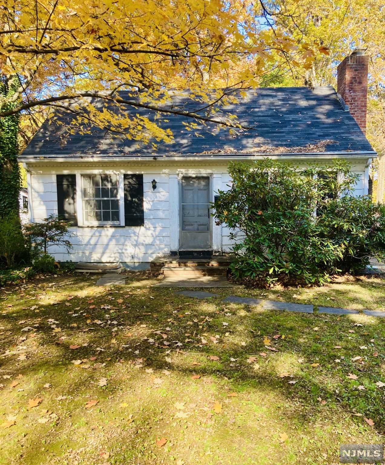 A fantastic opportunity to start building your life in Glen Rock! This classic cape is located on a quiet, tree-lined street in a charming neighborhood, despite being just a short stroll to town, transportation, and schools. Glen Rock schools rank among the highest in the State of NJ and the two nearby train stations make for easy commuting to NYC. This lovely, park-like property features a detached one-car garage and driveway for added off-street parking, as well as a private rear yard that's perfect for relaxation and recreation! Home is "As is"