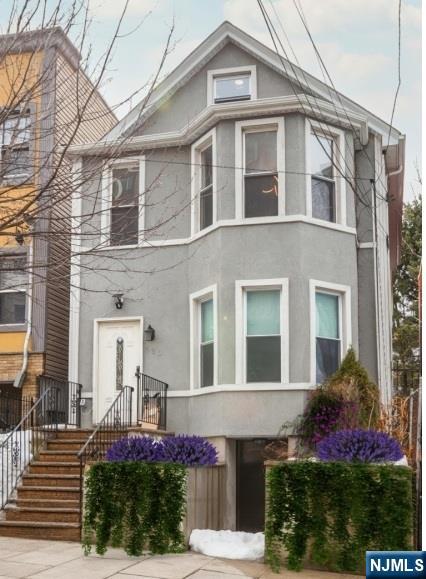 LOCATION, COMFORT & CONVENIENCE! Live in the heart of it all. Ideally located near NYC public transportation perfect for commuters and just 8 minutes from Port Authority. Enjoy close proximity to shopping, dining, and parks. This beautifully renovated apartment in a multi-family home features 2 bedrooms, office on the 3rd level and 2 full bathrooms, with laundry conveniently located in the unit and access to the backyard. The apartment has been completely renovated with a new kitchen, new bathrooms, new appliances, and new flooring, offering modern style and comfort throughout. This property offers the perfect balance of comfort, convenience, and urban living.