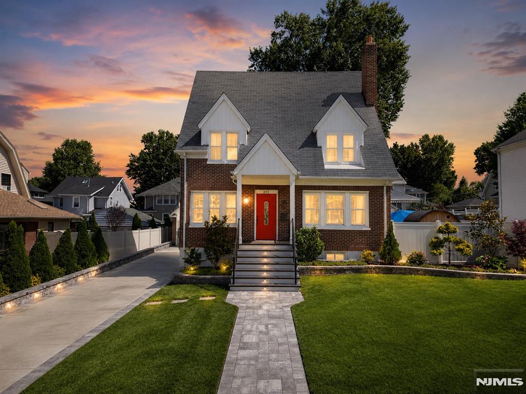 Welcome to this extraordinary home offering luxury, quality craftsmanship, and timeless design throughout. Featuring 3 bedrooms, + 2 bonus rooms,+ office, 2.5 updated baths, gleaming hardwood floors, and recessed lighting. Every detail has been thoughtfully completed. The custom kitchen showcases natural quartzite countertops, a full-height backsplash, premium cabinetry, The walkout basement includes a bonus room, full bath, and kitchenette with quartz countertops, offering flexible living space. The detached garage is fully finished, climate-controlled with a mini-split system, and currently used as a home gym. Enjoy a spa-like bath with a jacuzzi tub, a RainSoft water softening system, granite laundry countertops with sink, and a marble vanity in the powder room. Outside, you'll find a concrete driveway bordered by Legestone XL pavers, a new front canopy, Black Absolute flamed granite steps, automated color-changing LED landscape lighting, a Hunter sprinkler system, and a fully fenced backyard with a composite deck, Italian porcelain pavers, and a dedicated outdoor kitchen/barbecue area featuring Dekton and Lapitec countertops. Conveniently located near major highways, NJ Transit, shopping, parks, and NYC transportation. Designed with flexibility in mind this home is an exceptional opportunity for multigenerational living.