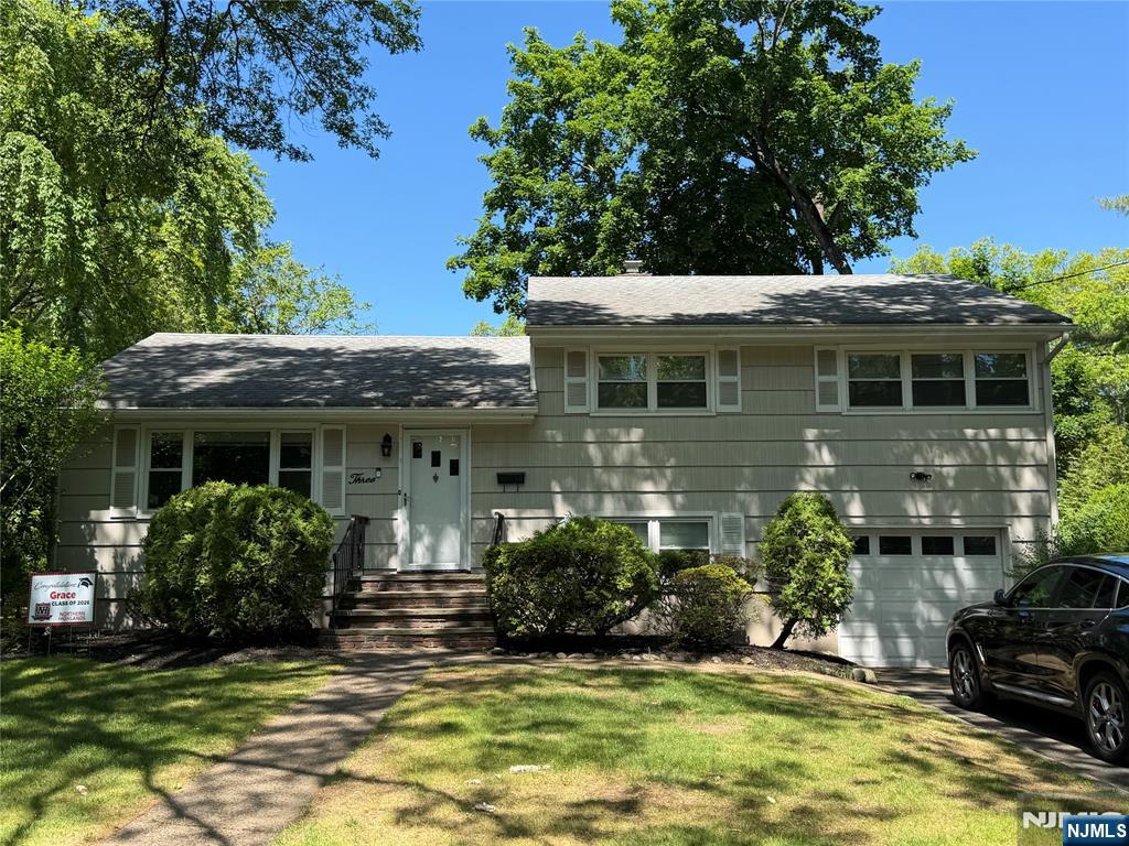 Welcome to this 3 bedroom, 1.5 bath home located within a lovely neighborhood in the desirable town of Ho-Ho-Kus. Upon entry you will be drawn into the spacious living room that is open to the dining room. The eat-in kitchen is adjacent & has newer stainless steel appliances, built-ins & granite counters. The main bathroom is located on the second floor along with two bedrooms & the primary bedroom, which has an attached powder room. The lower level is carpeted & perfect for a home office or second sitting room. The laundry room is also located on this level. Other features include: hardwood flooring, central air, 1 car garage & private yard with patio. This home has been lovingly cared for & well-maintained. Take advantage of the fantastic school district & proximity to town. This location is a commuter's dream with access to NY/NJ transportation as well as Park & Ride. Don't miss this one!
