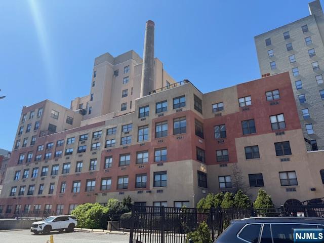 Welcome to Renaissance Towers Unit 4K. Modern city living in the heart of Downtown Newark. This well-maintained 2 bedroom, 1 bath home offers an open layout, high ceilings, natural light, recessed lighting, a modern kitchen, and in-unit washer/dryer. Enjoy unbeatable convenience just steps from Prudential Center, NJPAC, Whole Foods, Newark Museum, restaurants, shops, and parks. Located next to Newark Penn Station, offering an easy 20 minute commute to NYC. Gated community amenities include 24/7 concierge, fitness center, and valet parking (fee). Schedule your private showing today!