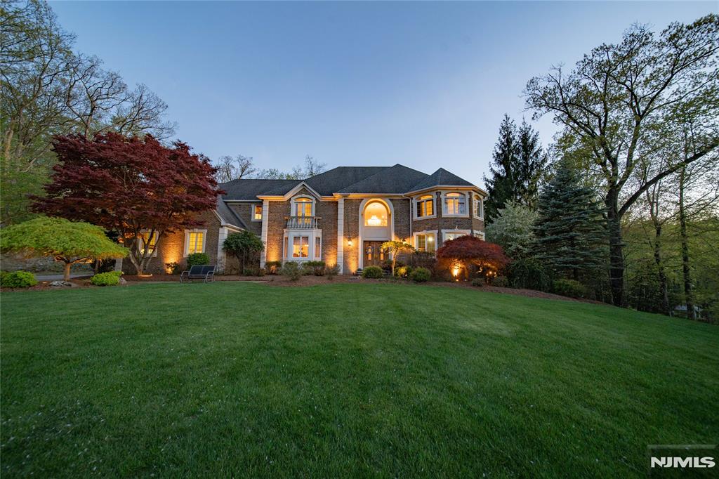 For a private showing call 201-647-4225. Rio Vista Mahwah is a private community on 466 acres of park like meadows and rolling hills surrounded by Campgaw Mountain and the Ramapo Reservation. This home is situated on a quiet tree lined street backing to acres of woods offering tranquility and privacy. Picture coming home from a long day of work and enjoying a dip in the pool with family and friends. Dinner time has arrived and you will enjoy entertaining on the large patio as you take in the wooded and mountainous views. Kids hanging out in the gazebo playing cards (or maybe on their phones). Sit by the fire pit or jump in the spa and watch the sun setting behind the mountains. Living in Rio Vista is a lifestyle. You will enjoy so many amenities including Basketball, Bocce Ball, Fitness Center, Billiards, Playground, Pickelball, and an inground pool. This home is roughly 5,000 square feet and offers a first floor study, large kitchen with breakfast room ideal for entertaining, banquet style dining room perfect for holiday gatherings. The 2 story great room offers tons of natural light and a gas fireplace to cozy up to during the colder months. The primary suite is a retreat away from lifeâ€™s craziness. Enjoy 3 full baths on the bedroom level. The finished lower level is a walkout and offers an area for play and relaxation with a bedroom, gym, full bath, and fireplace. Parents will enjoy the benefits of busing from K-12. Come see what the buzz about!