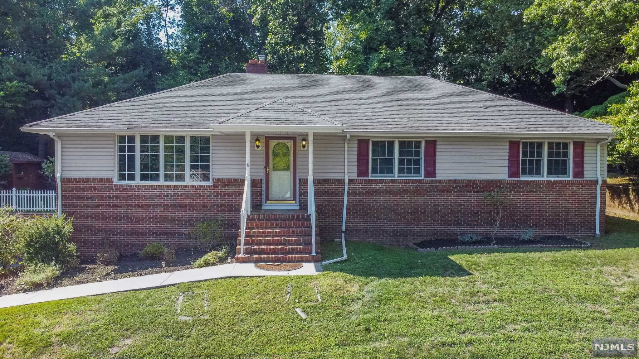 Amazing oversized ranch in a convenient location. Welcome Home! Home Features: huge living room with fireplace, formal dining room and eat in kitchen. Wonderful home for entertaining with open floor plan and relaxing three seasons room. 3 spacious bedrooms, owner's suite includes a walk-in closet as well as newer full bath. Large basement with high ceilings and 2 car garage. Plenty of room for storage in basement and attic. Hardwood floors, recessed lighting, beautiful private backyard with attached deck. Conveniently located. Minutes from Montclair State, NYC bus stop and train stations, downtown Montclair, shopping, tons of restaurants and major highways for ease of commuting.