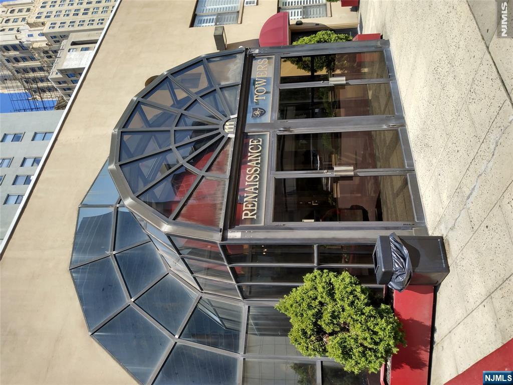 Welcome to Renaissance Tower where city life is calling! Prime location in the heart of downtown Newark at the corner of Mulberry and Market St. This updated unit features one large bedroom with a smaller bonus home office/second bedroom. Fall in love with the modern layout with an open-concept kitchen/dining/living room, in unit laundry and lots of storage. The secure building amenities include 24/hour concierge, fitness center, on-site super and maintenance staff. Off-street parking available for a fee. Perfect for a commuter, it's a short walk to Newark Penn Station (PATH, Amtrak, NJ Transit, Light Rail, local buses, and Greyhound).Steps from Whole Foods, local dining, nightlife, and cultural hot spots. It's also a quick drive to Newark Airport (EWR) with convenient access to Rtes 21, 22, 280, and 1 & 9. Schedule your private tour today! Don't miss this opportunity to own a piece of vibrant downtown Newark. Schedule a visit soon.
