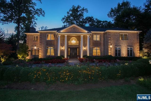 Completely renovated, better than new, METICULOUS, all brick center hall colonial on a FLAT, GATED one acre botanically landscaped property! ALL NEW BATHS, AND NEW KITCHEN! High ceilings! 6,465 square feet on the first two floors, plus an additional 3,000 square feet on the finished lower level. FIVE LARGE MAIN RECEPTION ROOMS! SIX BEDROOM SUITES, with sumptuous primary suite that features a sitting room/fireplace, wardrobe room and phenomenal spa-like primary bathroom. GORGEOUS POOL WITH SPA! Large outdoor terraces and fire pit. Smart house, music system, SPECTACULAR landscape lighting, generator. THIS HOUSE HAS MUNICIPAL SEWER! NO SEPTIC! Nothing to do but move in! A PERFECT HOME!