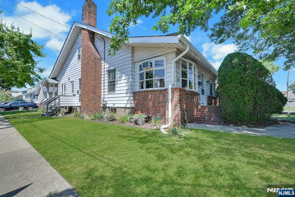 Well maintained two family home offering great value, flexibility, and a strong rental history. The first floor features two bedrooms, a bonus room, a heated enclosed porch, hardwood floors, a large living room with a wood burning fireplace, and an oversized eat in kitchen with an adjacent laundry room. The second floor includes one bedroom, one bath, a cozy living room, and an eat in kitchen ideal for rental income. A two car garage, double width driveway, and desirable location complete this fantastic opportunity.