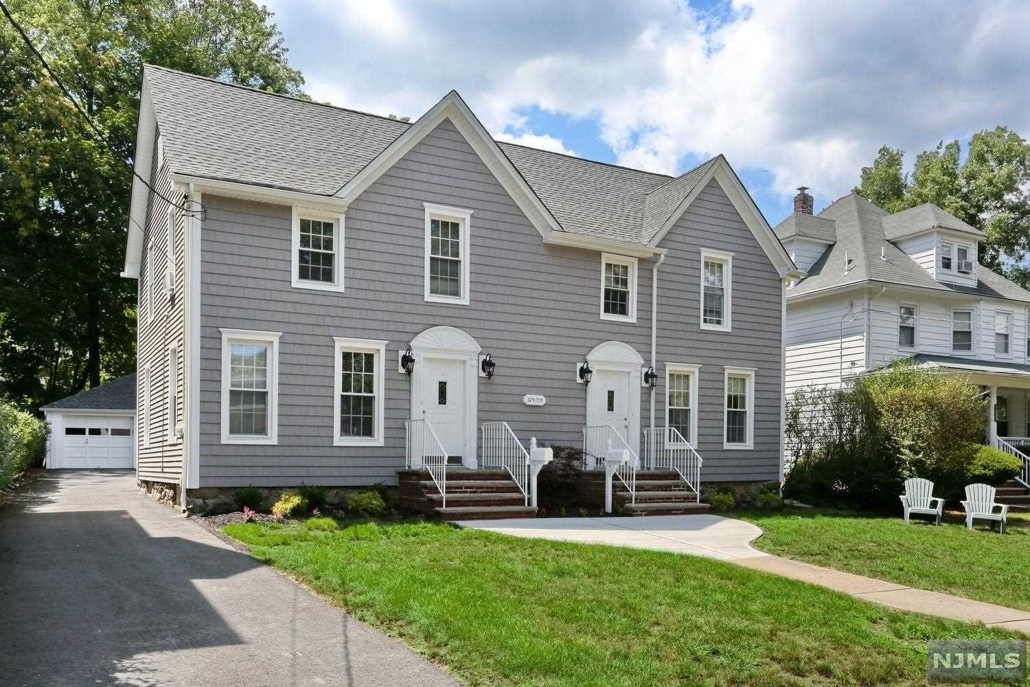 ***INCREDIBLE 2 FAMILY OPPORTUNITY IN ORADELL*** Come see this beautiful side by side 2 family home in Oradell, one of Bergen County's highly sought after towns. It feels like 2 separate homes, connected on one lot. Perfect to occupy one side and rent out the other, or just collect rent from current tenants. Meticulously maintained and recently updated. Newer vinyl siding, roof, driveway & walkways. Both units have entry foyer w/closet, living room, dining room, updated kitchens w/granite countertops, 2 large bedrooms, separate utilities, separate laundry in basement plus ample storage space, access to basement from inside and from the rear yard. The left has 1.5 baths, right has 2 full baths. Large private rear yard w/ patio and areas for grilling, playing or relaxing. Detached 2 car garage, plus more parking in driveway. Located down the block from downtown Oradell, bus & train to NYC, OPS (Elementary), and close to River Dell (MS & HS). Private showings by appt only.