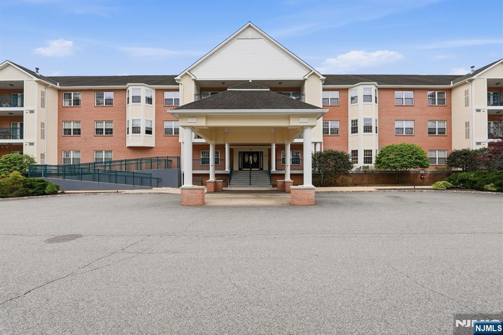 Beautifully renovated 1 Bed / 1 Bath condo in the sought-after FoxHill Manor 55+ Community. This turnkey home offers in-unit washer/dryer, spacious living/dining room, and a stunning modern kitchen with stainless-steel appliances, new cabinetry, premium counters, backsplash, and pantry. The large bedroom connects to a fully updated, handicap-accessible bath with stylish finishes. Crown molding throughout and a private balcony overlooking serene, wooded views elevate the space. Community amenities include a gym, community room, outdoor patio, courtyard, storage, and 2 assigned parking spots, one indoor in the garage and one outdoor plus visitor parking. Full-time superintendent. No pets. Buyer contributes 5% to the reserve fund, refundable upon sale.