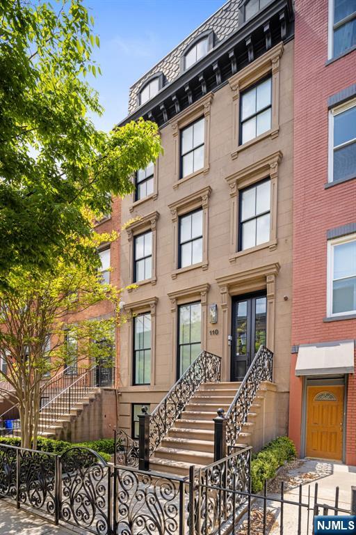 A rare offering in downtown Hoboken, this exceptional 3,200-square-foot triplex brownstone condominium with private garden and elevator was completed in 2017 by HRG Development, thoughtfully combining historic architectural character with modern design and craftsmanship. The residence offers three bedrooms plus a den, two-and-one-half baths, and the scale and privacy of townhouse living. A professionally designed 644-square-foot private garden extends directly from the home and features a reclaimed brick wall, water feature, and outdoor Wolf grill with dedicated gas lineâ€”creating a quiet and inviting setting for outdoor dining and entertaining. A privately keyed elevator services the residence, providing convenience and privacy. Additional features include California Closets, a dedicated laundry room, Lutron lighting in the main living areas, Marvin windows, oversized doors, and speakers throughout including two surround sound areas. The residence is wired for CAT-6 and high-speed WiFi, and benefits from advanced insulation, soundproofing, and two-zone high-efficiency HVAC. 110 Park Avenue is a boutique two-residence condominium offering private storage rooms and the security of an emergency backup generator. Ideally located in the heart of downtown Hoboken, moments from the shops and restaurants of First Street, the Hudson River waterfront promenade, Pier A Park, and convenient access to the PATH and NJ Transit to Manhattan.