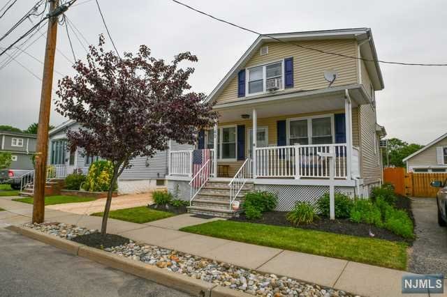 Chic Cape Cod with a charming lemonade front porch, private driveway, & loads of curb appeal backs up to a beautiful park. The bright entryway welcomes you to this open concept home with hardwood floors, recessed lighting, oversized windows, & updates throughout. Unwind in the living room & recreation room. Meal preparation is a breeze in the contemporary eat-in-kitchen complete with plenty of cabinetry, sleek granite countertops, a five burner gas stove, & a pantry. Enjoy meals in the adjacent dining room. A full bath is across the hall. The mudroom/laundry room offers access to the backyard. Upstairs three sunny bedrooms each have ample closet space. A basement offers unlimited storage potential. Relax or entertain guests in the serene backyard. An above ground heated pool with a newer deck will quickly become your favorite place to chill. With a patio, a swingset, & a lush lawn this property is ready to be enjoyed. Located near shopping, restaurants, mass trans & worship.