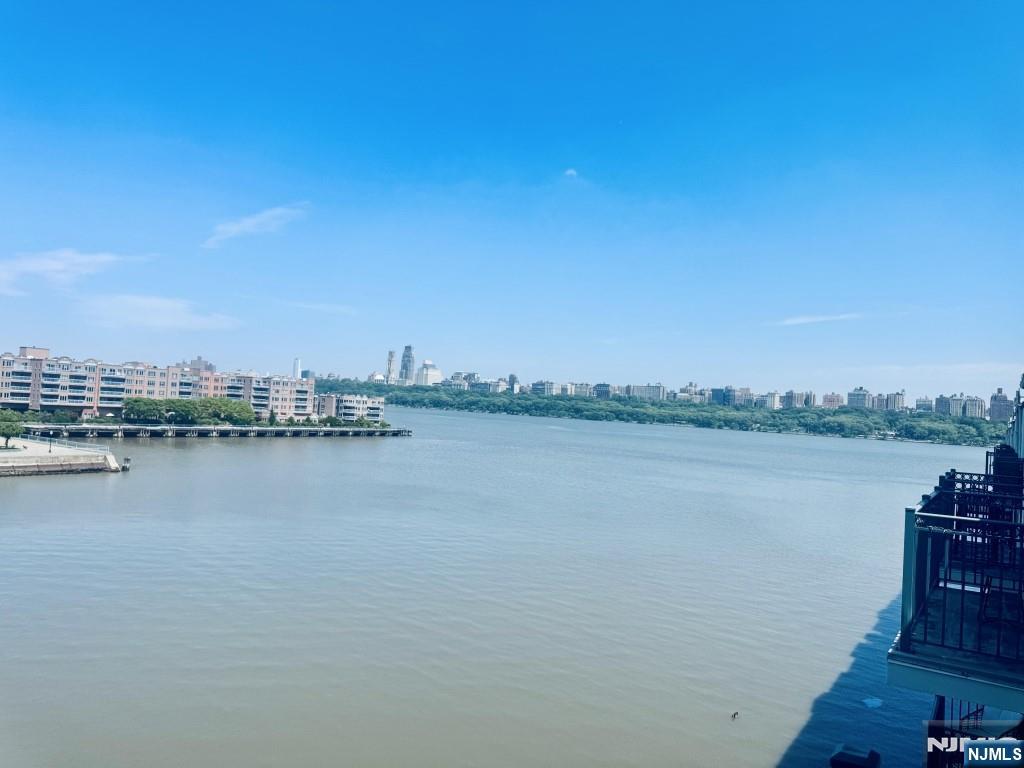 Experience luxury waterfront living in this stunning east-facing condo located at 340 The Promenade. Spanning approximately 1,500 sq. Ft., this meticulously maintained residence features 2 spacious bedrooms and 2 full bathrooms. Built in 2003, the home is equipped with central AC and gas-fired forced-air heating for year-round comfort. Situated within a prestigious gated community, the building offers top-tier amenities including 24-hour doorman security and a state-of-the-art fitness center. Close to the Hudson River Waterfront Pathway, located just steps from your door. The monthly HOA fee covers essential services including water and sewer. This property combines the tranquility of a riverside retreat with easy access to local dining and shopping. Whether you are looking for a primary residence or a sophisticated urban escape, this Edgewater gem offers the perfect balance of comfort, security and location.
