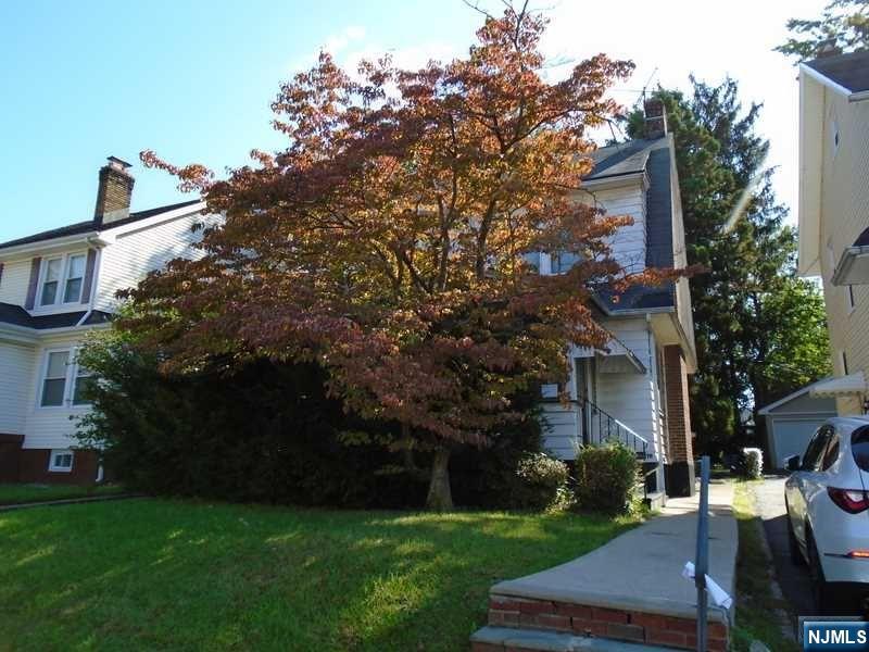 Large colonial home features formal living room, dining room, eat in kitchen, bedroom and enclosed porch, second floor has three large bedrooms, and master bathroom and walk up attic unfinished, full basement unfinished. active oil heat, and gas hot water heater, large backyard with detached two car garage. Plenty of possibilities, and close to all major highways, schools and shopping.