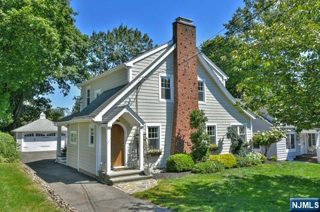 Stunning Colonial in desirable Wyckoff location. This beautifully remodeled home offers a blend of modern amenities & classic charm. The Kitchen is a chef's dream, featuring gorgeous Quartzite countertops, peninsula, newer top-of-the-line appliances, and an open flow to the dining area, perfect for entertaining. The elegant Living Rm boasts a cozy WB Stove, while an additional Den provides versatile space for a home office/play rm. Gorgeous Powder Rm & a convenient Mud Rm complete the 1st fl. 2nd fl boasts a sun filled Primary BR w/abundant closet space, an exquisite Full Bath & additional BR. The recently finished lower level adds valuable living space, w/Family Rm, Laundry Rm, Pantry & Utility Rm. Step outside to enjoy the covered open porch, stone patios & private backyard, perfect for relaxing/hosting outdoor gatherings. There is a 2-car detached garage with lrg Storage Rm. This home offers the perfect blend of convenience & tranquility. Be ready to immediately fall in love!