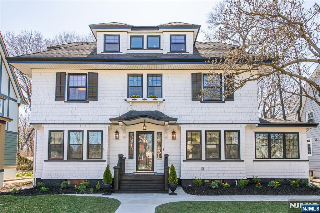 This meticulously renovated 5-bed, 4.5-bath Center Hall Colonial in Erwin Pk blends elegance with modern sophistication. The open concept main floor integrates historic details with contemporary updates. The living rm, with a wood-burning fireplace & French doors to a private den, offers yard views, while the dining rm & breakfast bar invite formal & relaxed entertaining. The custom kitchen, with high-end appliances and ample storage, steps down to a family rm with yard views, a mudroom, a rear deck door, and a powder rm. The 2nd floor primary suite features a walk-in closet & a luxurious bath with a large shower for 2. The 3d floor includes a full bath & flex space for 2 bedrooms, a home office, or nanny suite. The basement features a family rm, exercise rm, wine rm, full bath, a & laundry rm. The deep yard, with a manicured lawn and custom lighting, is perfect for garden parties & star-lit evenings. Additional features include 2-zone A/C, irrigation, and proximity to NYC transit.