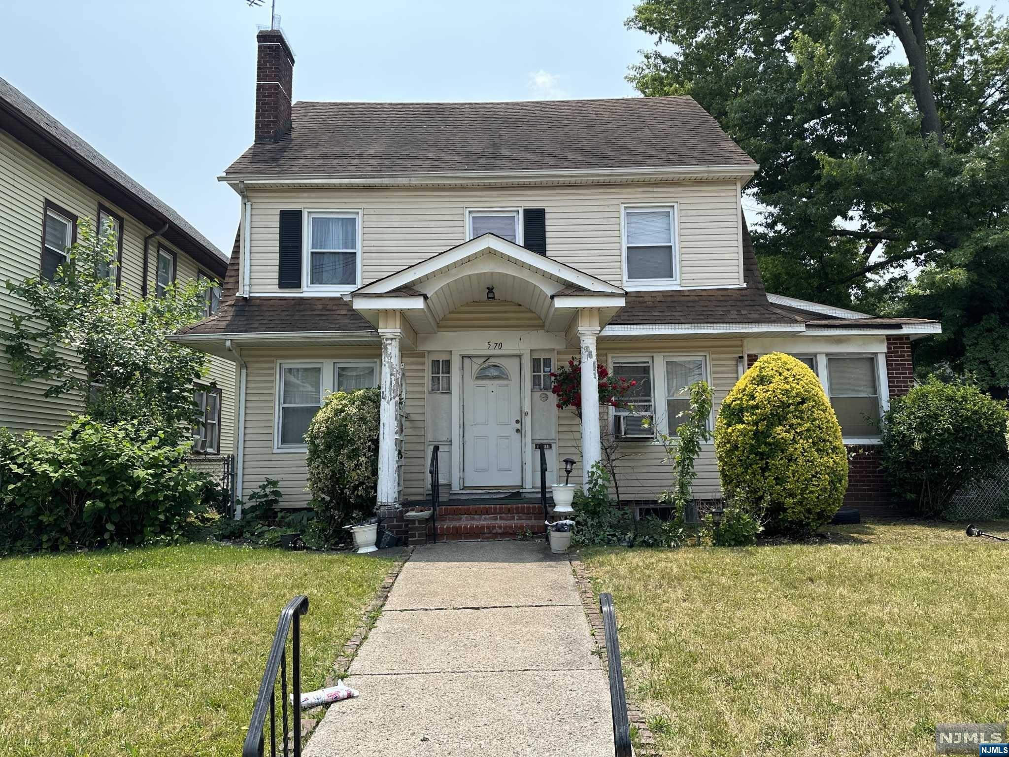 WONDERFUL OPPORTUNITY TO BRING YOUR IMAGINATION AND CREATE YOUR DREAM HOME. LARGE CORNER LOT WITH DRIVEWAY AND TWO CAR GARAGE. LARGE ROOMS THROUGHOUT. PLENTY OF POTENTIAL.