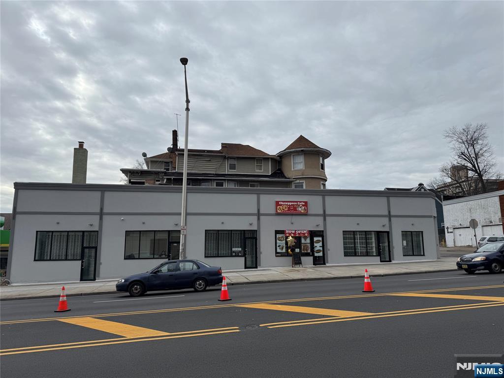 Brand new construction commercial space available for lease on highly trafficked Central Avenue in East Orange. Prime storefront location with excellent visibility and strong foot and vehicle traffic. The space features vaulted high ceilings, creating an open and flexible layout suitable for a variety of business uses. Recessed Lighting. Equipped with a mini-split system for efficient heating and air conditioning. Ideal opportunity for a new or expanding business seeking strong exposure. Conveniently located near major highways and public transportation.