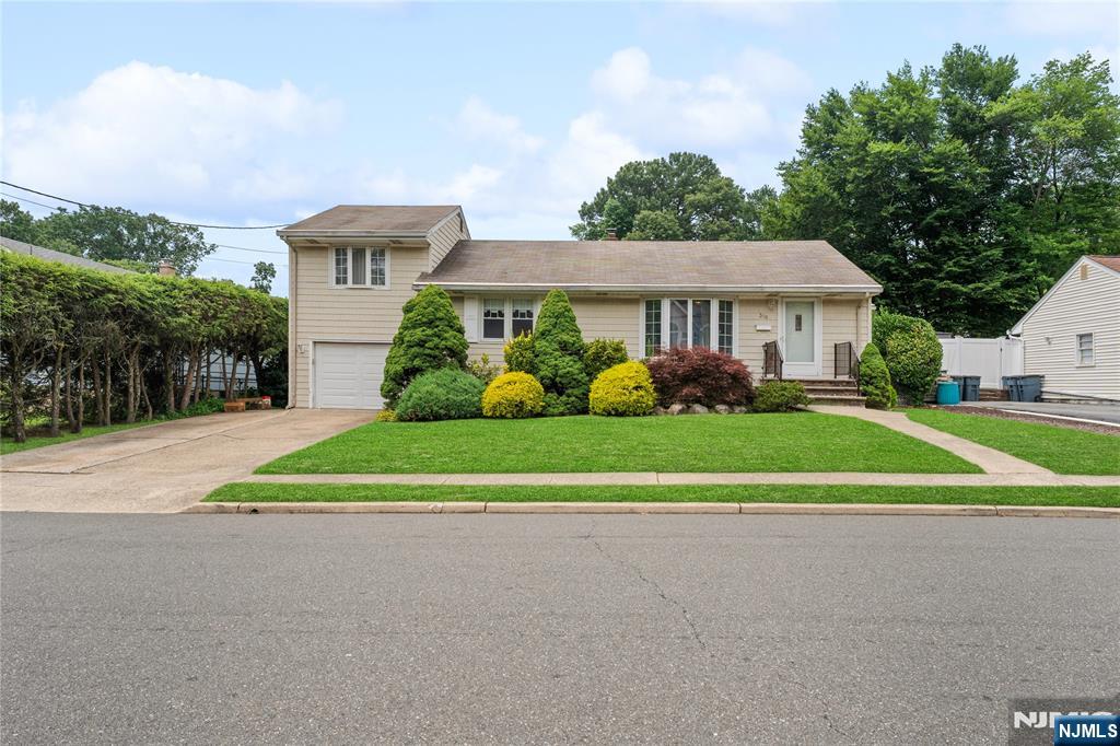 Opportunity awaits in this spacious expanded ranch offering endless potential to "make it yours" in one of the area's most desirable neighborhoods! This 3-bedroom, 2-full-bath home is the perfect canvas to create your dream home. The inviting living room features hardwood floors and a beautiful bay window, flowing into a spacious eat-in kitchen with abundant cabinetry and a skylight and the adjacent formal dining room opens to the backyard through sliding glass doors. The first floor also has a bedroom, full bath with skylight, and a versatile office/study area with a door to the attached tandem 2-car garage. A second-floor addition offers two generously sized bedrooms and a second full bath. The finished walkout basement expands the living space with a wet bar, kitchenette, half bath, laundry area, and ample storage. Step outside to a private backyard featuring a solar-heated in-ground saltwater pool (not currently opened) with a vinyl liner, and multiple storage sheds. 200 Amp Electric, reverse osmosis water filtration system, newer above-ground oil tank, and driveway parking for 4+ cars. Ideally located in a sought-after neighborhood, near top-rated schools, houses of worship, shopping, Hackensack University Medical Center, public transportation, and major highways. This property offers unlimited potential and a rare opportunity to add your personal touch and unlock the tremendous value this home has to offer! Outstanding location & town!