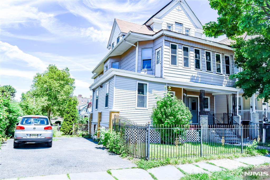 Huge 2 Family with parking and bonus 3rd floor & Seperate utilities. Sold in as is condition. Buyer responsible for all CO required repairs.