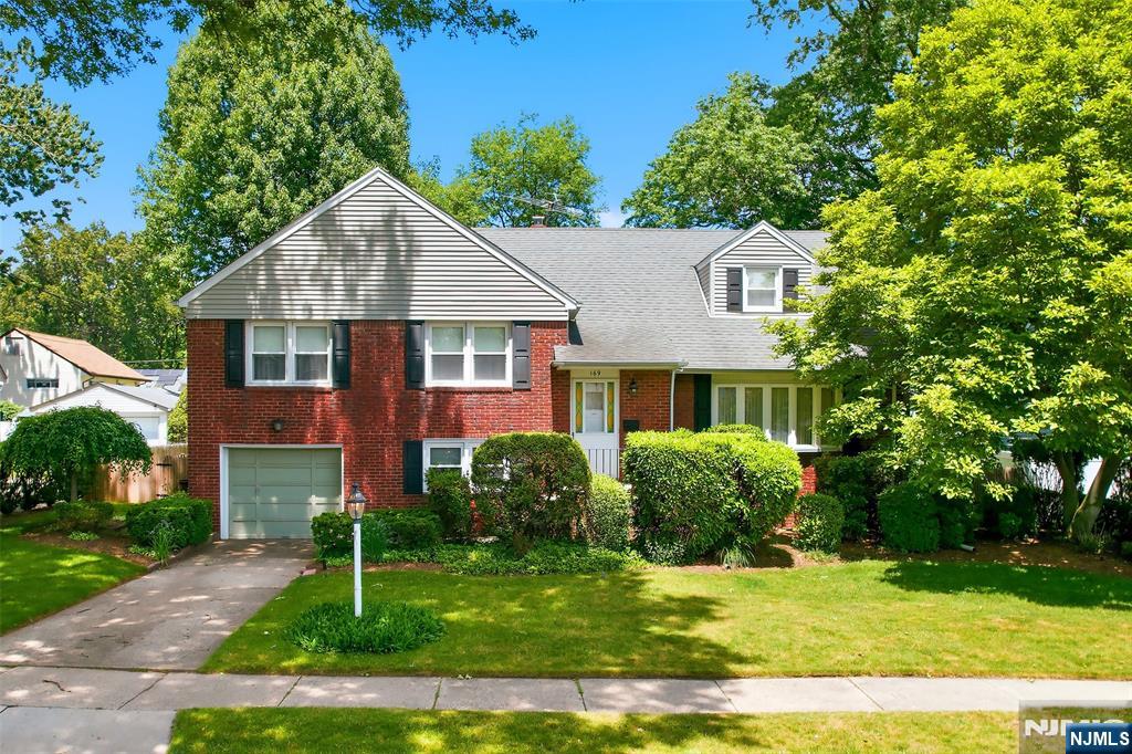 Welcome to this lovely 4-bedroom, 2.5-bath split-level home, offering a wonderful opportunity to create the home of your dreams. Well-maintained and in great condition, this property provides a solid foundation for buyers looking to add their personal style and vision. Offering multiple levels, each floor provides its own unique benefits, creating flexible spaces for relaxation, entertainment, work, or family activities. The thoughtful layout allows for both privacy and functionality, making it ideal for a variety of lifestyles. Enjoy year-round comfort with central air conditioning and forced-air heating. The generously sized bedrooms provide ample space, while the common living areas offer a warm and welcoming atmosphere for gathering with family and friends. This property delivers the space and versatility you've been looking for. Outside, the spacious, fully fenced backyard provides privacy and ample space for outdoor entertaining, gardening, pets, or simply enjoying the outdoors in your own private retreat. Ideally located near schools, shopping, and major highways, this home provides excellent accessibility for commuters. Enjoy easy access to Manhattan via nearby bus service, making travel into the city both convenient and efficient. Combining indoor comfort, outdoor space, and a prime location, this property presents a wonderful opportunity to enjoy the best of suburban living with close proximity to urban amenities.
