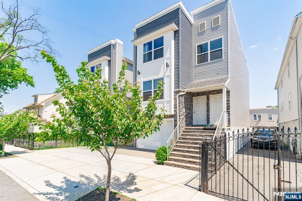 NEWLY BUILT, UNIQUE two-family featuring a rare ground-level unit with 2 rooms and a full bath, home office, or added flexibility. The definition of turnkey, located in Newark Built by an experienced builder with no expense spared, showcasing quality craftsmanship, modern finishes, and thoughtful design throughout. ideal for Owner-occupants or investors seeking low maintenance, strong rental appeal, and long-term value in a high-demand location close to major transportation, shopping, and dining. come turn this house into a home before someone else does!