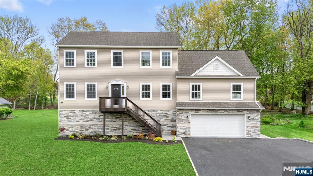 Fully renovated and super spacious, this custom home sits on a large, level lot and is truly move-in ready. The bright white, brand-new kitchen is the heart of the home, featuring quartz countertops, new stainless appliances, and a stunning center island. It flows seamlessly into an inviting living room and an huge dining room, creating an open, airy feel perfect for everyday living and entertaining. This level offers amazing flexibility with two additional bedrooms, a full bath, a private home office tucked behind charming French doors, and a huge pantry for extra storage. With 5 generous bedrooms - all with abundant closet space, 3 beautifully updated baths, and a massive flex space ideal for a gym, game room, or media room, there's room for everyone and everything. Thoughtfully updated from top to bottom, the home features a freshly painted interior and exterior, new lighting, new flooring, and all-new systems including furnace, AC, and tankless hot water heater. Outside, enjoy a brand-new driveway, gutters,walkways, patio, and professional landscaping. Since the home was raised, you also get the bonus of an oversized 2-car garage and abundant storage space. This is a rare opportunity to own a beautifully updated home with generous square footage, modern style, and a fantastic neighborhood, come see the space and picture yourself home!