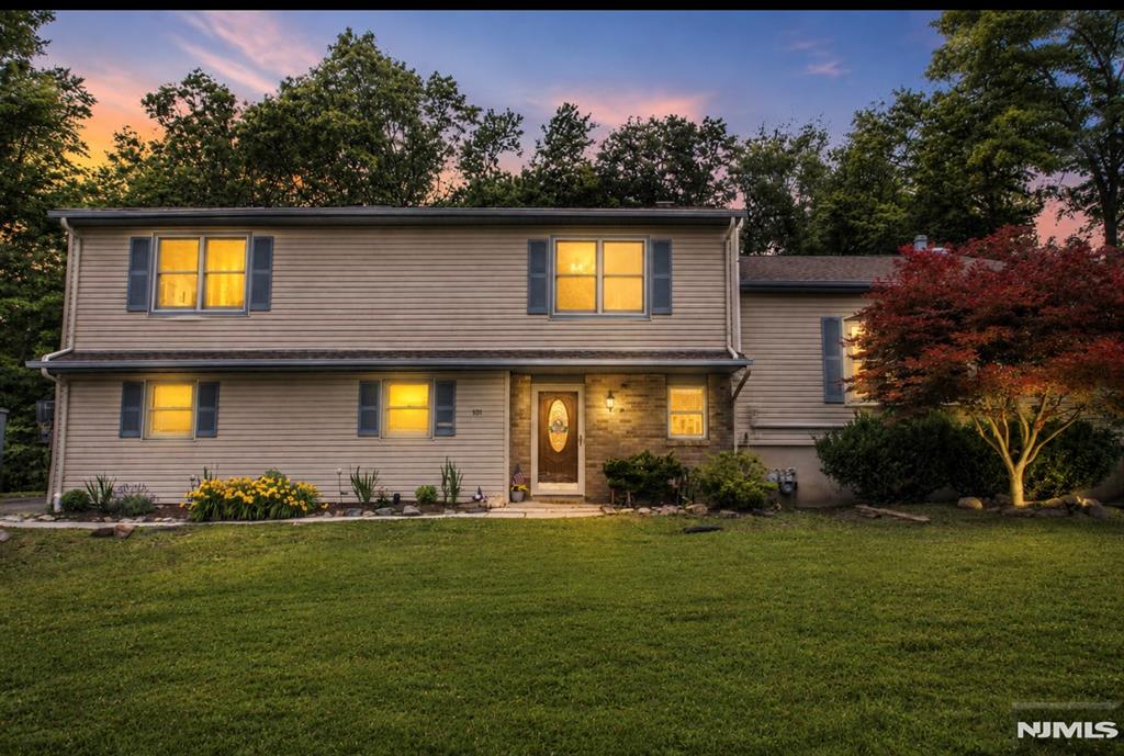 Discover this remarkably spacious Custom 6-bedroom Split-Level home nestled in the highly desirable Old Milford Estates neighborhood. Thoughtfully designed, this exceptional residence offers abundant living space and custom features throughout.The heart of the home is the expansive, open-concept kitchen featuring a breakfast bar, center island, charming kitchen nook, and soaring ceilings that flow seamlessly into the impressive great room with a cozy fireplace. Entertain with ease in the formal dining room, complete with a custom built-in breakfront, while oversized windows fill the home with natural light. The generous bedroom sizes are sure to impress, including the stunning primary suite which boasts high ceilings, a wall of windows, dual walk-in closets, and a private en-suite bath. A separate ground-level guest suite provides incredible flexibility for extended guests, or multi-generational living. The open floor plan continues through the living and dining areas, where sliding glass doors lead to the patio and outdoor entertaining spaces. Additional highlights include a newer roof, city water, city sewer, underground utilities, central air conditioning, hardwood floors, a welcoming foyer, a spacious great room with a second fireplace, a finished basement, and a deck perfect for relaxing or hosting gatherings. Offering space, character, and endless possibilities, this beautiful home is ready for its next chapter. Don't miss the opportunity to make it your own!