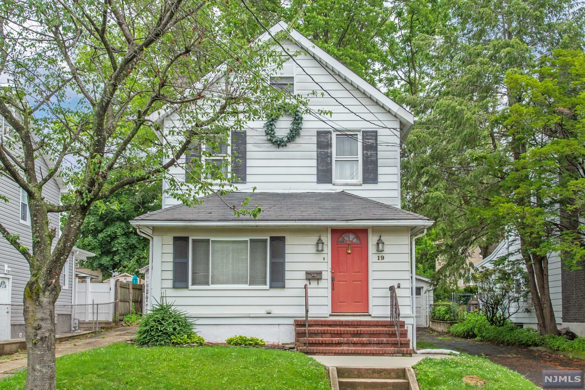 Spacious Colonial with updated kitchen with Quartz countertops and newer cabinets. Hardwood floors .Formal Living room with wood burning Fireplace & Formal Dining Room. Large rear deck.