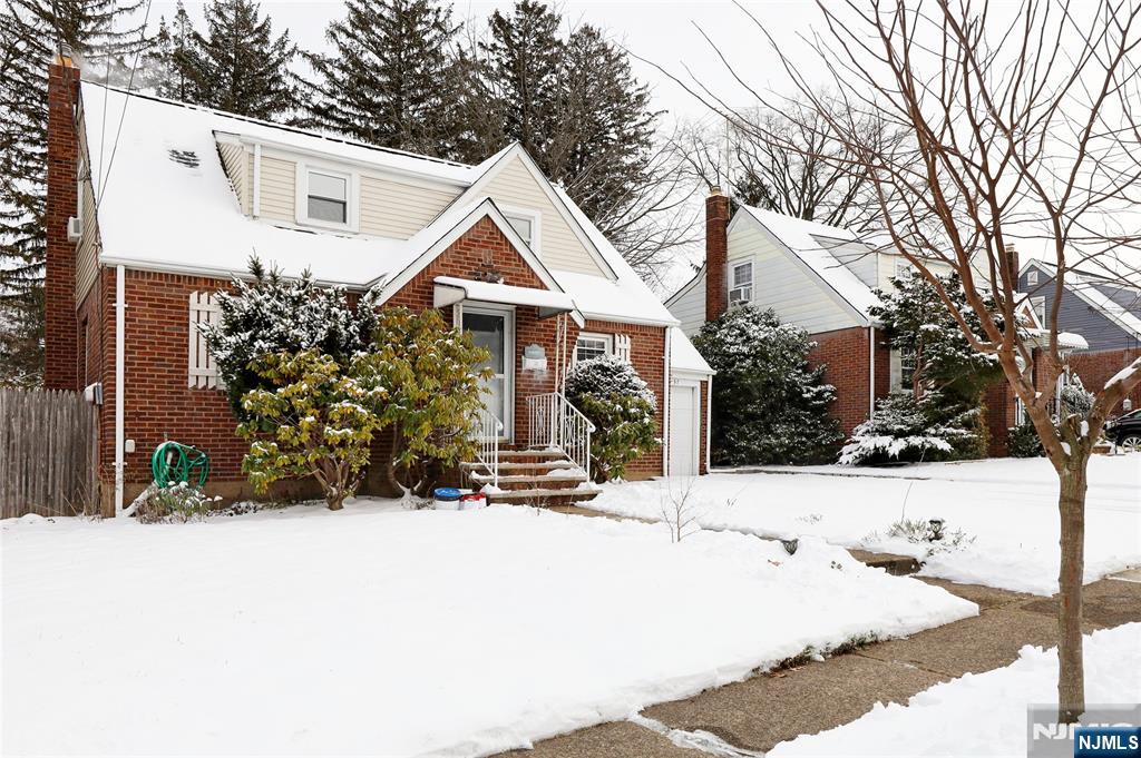 Beautifully maintained brick Cape Cod in a prime location. This freshly painted 4bed, 1.5 bath home sits close to public transportation, shopping, and schools. The first floor features a bright living room, an updated U-shaped kitchen with a dining area, and direct access to the rear patio and fully fenced-in backyard, two generous-size bedrooms, and a renovated full bath complete the main level. The second floor offers two additional bedrooms with great versatility. Hardwood floors run throughout the home. A fully finished basement provides valuable extra living space and includes a convenient powder room. Ready to move right in!