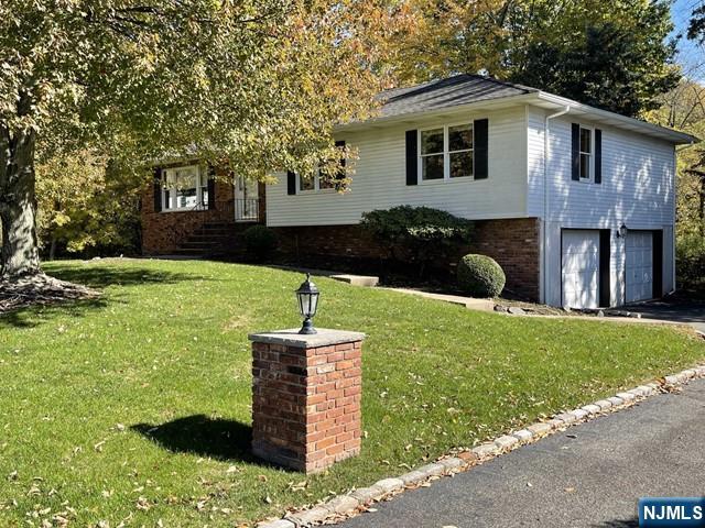 Welcome to the highly coveted South/North Colonial Drive neighborhood loop of Harrington Park! This beautifully maintained turnkey 3-bedroom, 2-bathroom ranch sits proudly on a rare, sprawling 0.42-acre lot, offering the perfect blend of suburban tranquility and modern convenience. Step inside to a light filled, functional layout featuring pristine hardwood floors and a spacious living area ideal for everyday comfort. The heart of the home is completely move in ready and features a suite of newer appliances (all under 3 years old), including a brand-new washer and dryer-saving you immediate out of pocket expenses. The massive, parklike back/side yard is an entertainer's dream, providing an expansive footprint rarely found in the area. Enjoy top rated schools, close proximity to town parks, and an easy commute into NYC. Truly a turnkey gem in an unbeatable location. OWNER IS A LICENSED NJ REAL ESTATE AGENT.