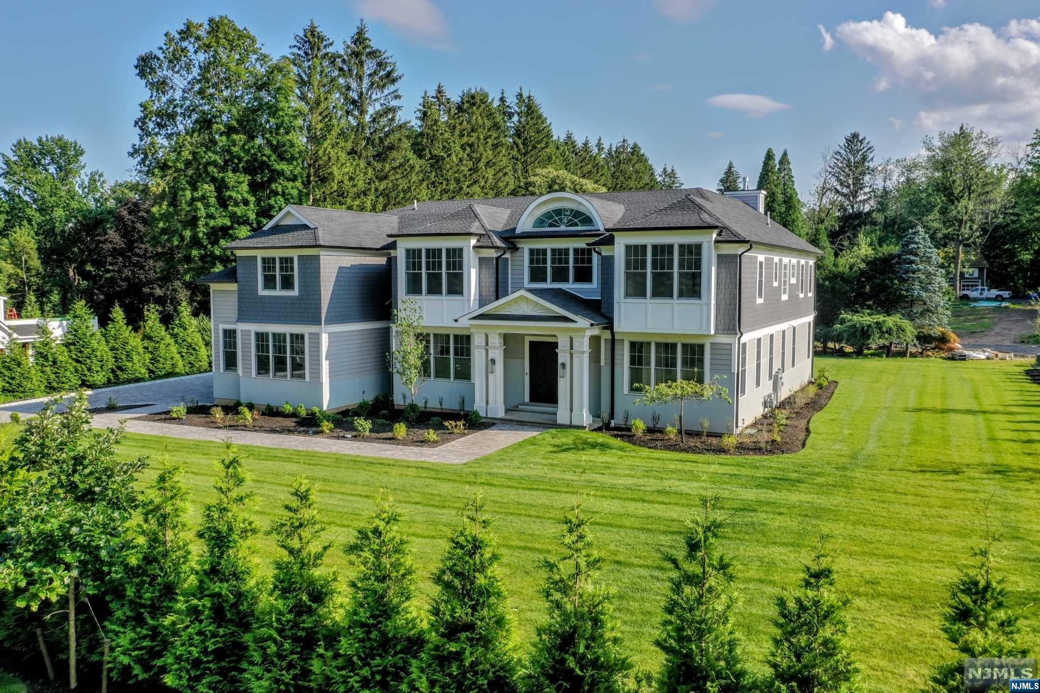 MOVE RIGHT IN! THIS SPECTACULAR NEW CONTRUCTION IS COMPLETELY FINISHED & READY FOR OCCUPANCY! ZAMPOLIN DESIGNED BY JEANNOT ESTATES,THE TAYLOR HOUSE AT HENNION RIDGE BOASTS 7 ENSUITE BRS, 7FBS/2 HALF BTHS, SOARING 2 STY FOYER W/BARREL CEILING & GRAND CNTR STAIRCASE, OPEN FLOOR PLAN, FRONT & BACK STAIRCASE, HUGE BUTLER'S PANTRY W/SINK, STUNNNING GOURMET KITCHEN W/DBL ISLAND, TOP-OF-LINE APPLIANCES, OPEN TO FAM RM W/FPL, 1ST FL GUEST STE, GRAND FDR, FLR & LIBRARY. LUX PRIMARY BR SUITE W/ENTRY GALLERY,FPL,TRAY CEILING,2 HUGE CUSTOM WALK-IN CLOSETS & SPA-LIKE PRIMARY BATH W/RADIANT HEAT. FULLY FIN LOWER LEVEL W/WET BAR/BILLARD RM/REC RM, TIERED THEATER, EXERCISE RM,PR & ADDL BR SUITE W/FB. 10 FT CEILING ON 3 FLRS, 4 CAR GARAGE, GENERATOR, SECURITY/CAMERAS. OPTION TO ADD POOL/SPA FOR PERFECT RETREAT! AWARD WINNING SCHOOLS. EASY ACCESS TO HWYS, SHOPPING OR RECREATION. OVER 7200 SQ FT 1ST/2ND FL + OVER 3300 SQ FT IN LL TOTALING 10,500+ SQ FT. 10 YR NJ BUILDER WARRANTY. A DREAM COME TRUE!